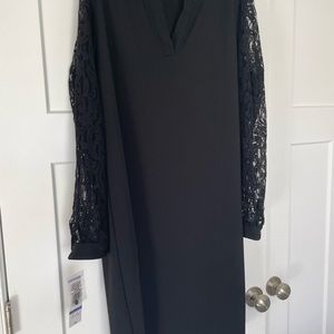 Brand new black cocktail dress.